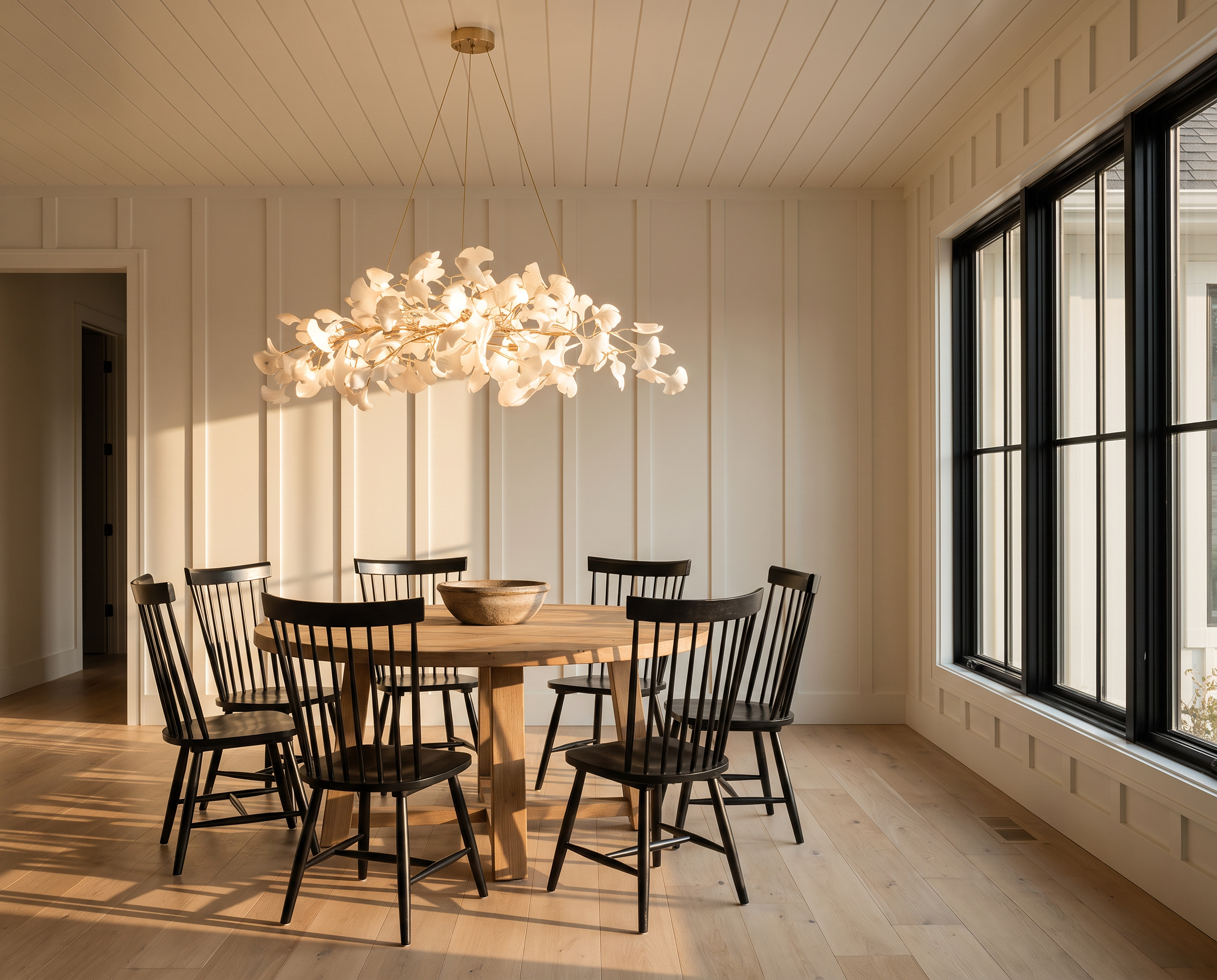 Gingko Plume Chandelier over an oak dining table