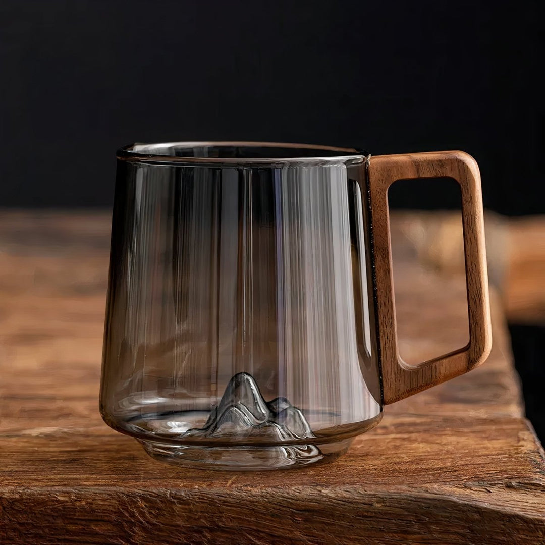 Elegant slanted coffee cups made of smoky glass with walnut wood handle